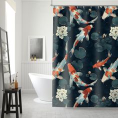 a shower curtain with koi fish and water lilies on it in a bathroom