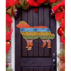 a door decorated for christmas with a colorful dog