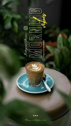 a cup of coffee sitting on top of a blue saucer