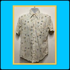 1970s printed shirt by Kmart. Size medium 15-151/2. The cotton blend shirt has a white base color with an abstract design in shades of blues & mustard yellow. The shirt has a pointed loop collar, five button down front, short sleeves and one patch pocket. The shirt is in vintage condition.  Please see small  stains that may or may not wash out. The label states K-Mart perm press 50% cotton 50% polyester Size medium 15-15 1/2. Please see measurements for proper fit.  MEASUREMENTS: (All measurements were taken lying flat) Shoulders -17'' (measured on back of the shirt from seam to seam) 22" (measured from pit to pit) Sleeve- 9.5"  (measured from shoulder to cuff) Sleeve- 5" (measured from pit to cuff) Length - 31" (measured on back of shirt from top of collar to the bottom hem) Cuff Sleeves, Mustard Yellow, Base Colour, Button Downs, Shades Of Blue, Abstract Design, 1970s, Cotton Blend, Short Sleeves