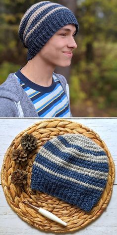 a young man wearing a blue and white striped hat next to a basket with a knitted beanie on it