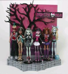 the monster high dolls are lined up in front of a pink background with black trees