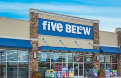 a five below store front with blue awnings