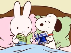 two stuffed animals are reading books in bed