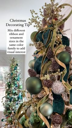 a christmas tree decorated with green and gold balls, ornaments and ribbons is featured in the magazine