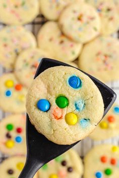 a close up of a cookie on a spoon