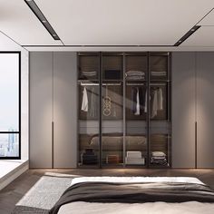 a bedroom with a bed and closets in it