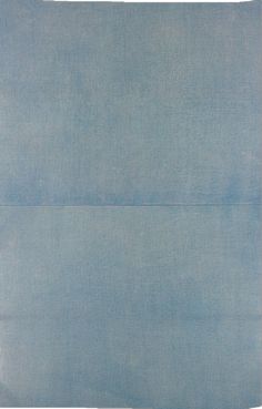 an image of a blue sheet that looks like it has been folded up in half