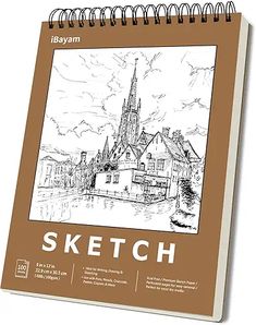 a sketch book with an image of a church