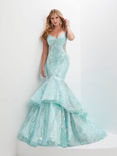 This stunning mermaid gown has a sweetheart neckline with spaghetti straps, a fitted body, and a full double-tiered mermaid skirt with a sweep train, all done in a beautiful pearl, bugle bead and sequin swirl design. Sequin Print Tiered Mermaid Dress by Panoply 14150 Panoply Collection by the House of Wu: Spring 2023 Fabric: Floral Sequins Please note: There may be a loss of sequins while wearing this dress due to the nature of the fabric Colors: Aqua, Royal Blue Sizes Available (as of 12/12/202 Pageant Dress With Fitted Bodice And Mermaid Hem, Prom Season Fishtail Mermaid Dress With Ruffles, Mermaid Dress With Corset Back For Gala, Mermaid Gown With Fitted Bodice For Prom Season, Mermaid Dress With Sweep Train For Pageant, Fitted Bodice Mermaid Dress With Sweep Train For Pageant, Mermaid Dress For Pageant Prom Season, Mermaid Dress With Detachable Train For Prom Season, Mermaid Dress For Pageant And Prom Season