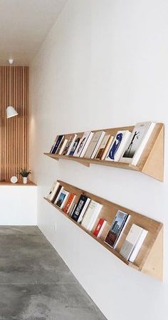 two bookshelves are on the wall in this room