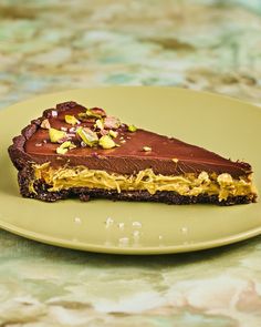 a piece of chocolate pie on a yellow plate