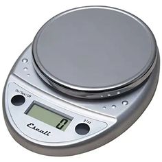 an electronic scale with the time displayed on it