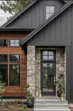 a house with stone and wood siding