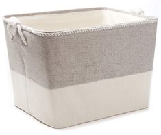 a gray and white storage basket with handles