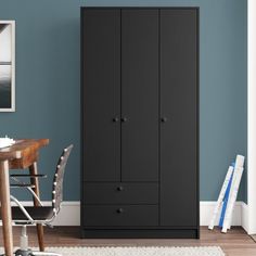 Mercury Row® Campuzano Manufactured Wood Armoire & Reviews | Wayfair Affordable Wardrobe Closet, Black Green Bedroom, Low Wardrobe, Narrow Wardrobe, Closet Redo, Storage Center, Cool Home Ideas, Wood Armoire, Screen Room