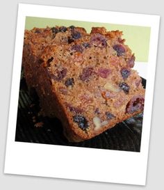 two pieces of fruit cake sitting on top of a grill