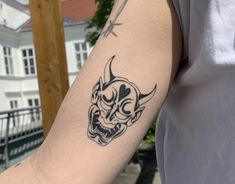 a person with a tattoo on their arm