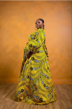 This immaculate huge/ puff sleeve African print maxi can be worn to several occasions. From wedding to grad to even a pregnancy photo shoot.