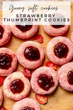 strawberry thumb cookies are arranged on a cutting board with the words grovey soft cookies