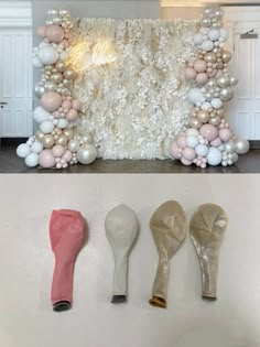 three different types of balloons on display in front of a wall with flowers and leaves