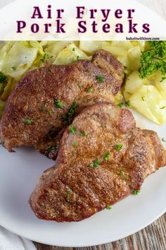 two steaks on a plate with potatoes and broccoli