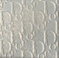 an image of a textured surface with numbers and letters in white on grey background