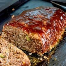 a loaf of meatloaf sitting on top of a pan