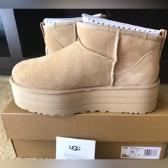 Up For Your Consideration Is A Pair Of Ugg Ultra Mini Platform Boots Women’s Size 9 In A Sought After Color - Mustard Seed! New In Box; A Nice Present To Start The New Year! The Trendy Pair Will Make Your Feet Comfortable And Toasty Warm On Current Cold Weather. Don’t Miss The Great Chance To Get The Popular Pair Now And Wear It Like Many Celebrities Do! Purchased From Ugg Official Website; 100% Authenticity Guaranteed! The Hard To Find Pair Is In Stock; Ready To Ship! Reasonable Offers Only! Ugg Ultra Mini Platform Mustard Seed, Ugg Ultra Mini Platform, Ugg Ankle Boots, Ugg Boots Classic Short, Ugg Ultra Mini, Flower Boots, Ugg Booties, Chestnut Boots, Round Toe Boots