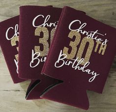 two red and gold birthday cards with the number 350 on them sitting next to each other