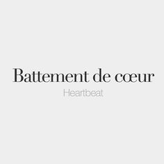 the words battement de coeur heartbeat are in black and white letters on a gray background