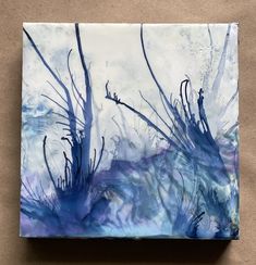 an abstract painting with blue and white colors