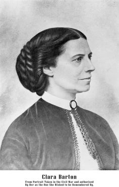 an old black and white photo of a woman with braids in her hair,