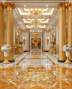 an elaborately decorated hallway with gold columns and chandeliers on either side of the hall