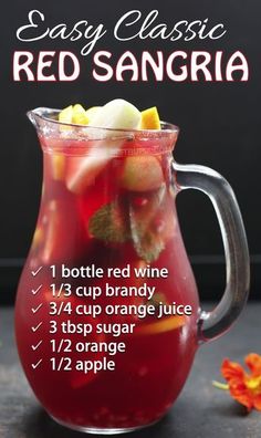 a glass pitcher filled with red sangria next to an orange flower and text that reads easy classic red sangria