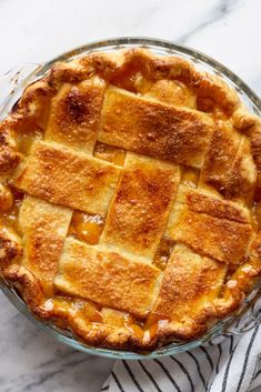 a pie sitting on top of a white table