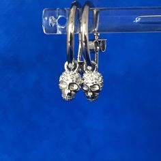 A  pair of sterling silver  .925 small skull/memento mori earrings sterling silver +Czs .2 cms overall  nice quality www.butlerssilver.com We will always do our upmost to help but once your item leaves us we cannot prevent delays,weather,strikes pestilence and plague We have a really good record of delivery.... even if arrival is sometimes slow. Small Skull, Memento Mori, Earrings Sterling Silver, Sterling Earrings, Art Object, Silver 925, Belly Button Rings, Sterling Silver Earrings, Jewelry Earrings Dangle