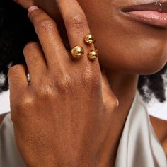 Bring your distinctive style to the forefront with this Soko Obiti Statement Ring. Brass with 24K gold plate Showcases three curved ribbons punctuated in multi-sized polished ball ends Handcrafted by artisans in Kenya using traditional techniques Designed for and exclusively available at Zales Brass Jeqelry, Cheap Statement Gold Midi Rings, Cheap Statement Rings In Yellow Gold, Gold Dress Rings, Cheap Yellow Gold Statement Rings, Statement Rings Unique, Domed Ring, Black Women Art, Traditional Techniques