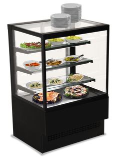 a deli display case with many plates and bowls on it's sides,