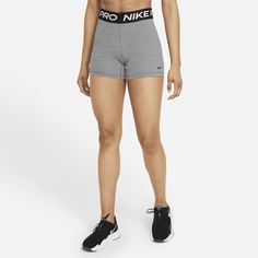 The Nike Pro 365 Shorts wrap you in stretchy fabric with Dri-FIT technology to keep you feeling supported and dry during intense workouts. This product is made with at least 50% recycled polyester fibers. Grey Nike Pros, Nike Pro Shorts, Gym Fits, Women Volleyball, Shorts Nike, Teenager Outfits, Intense Workout, Female Fashion, Nike Pros