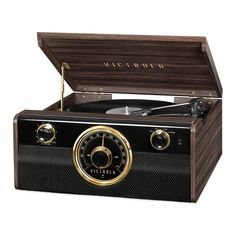 an old fashioned record player with wooden case