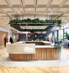 the inside of a restaurant with plants growing on the counter and people walking around in the background