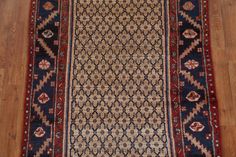 an antique persian rug is laying on the floor