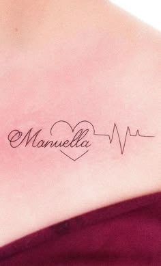 a woman with a heart and heartbeat tattoo on her chest that says manuella in cursive writing