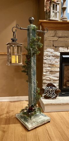 a lamp that is sitting on top of a wooden floor next to a fire place