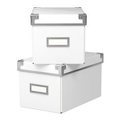 two white storage boxes with metal handles