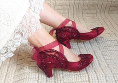 "Burgundy lace embellished wedding shoes for bride or matching bridesmaids shoes. Fall weddings or moody dark weddings; these jewel toned shoes add a beautiful sparkle on your dress... Low heel bridal shoes keep you comfortable all night long! Gothic wedding shoes, custom wedding gift, Valentine's gift for girlfriend. Bordeaux satin wedding heels are designed with embroidered floral lace appliques. Burgundy glass beads and shiny sequins are used on the embroidery, creating a nice contrast with your wedding dress. Organza ribbons can be tied on the front as a bow, or around your ankle ballerina style. They are made of soft smooth satin and delicate lace, each handmade item is unique and can differ in details only slightly. Custom details can be added on this design, soles can be personalize Red Wedding Shoes Brides Heels, Red Wedding Shoes Low Heel, Gothic Wedding Shoes, Red Lace Heels, Satin Wedding Heels, Low Heel Bridal Shoes, Dark Weddings, Deep Red Wedding, Embellished Wedding Shoes