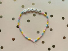 This friendship bracelet is inspired by Taylor Swift’s song You Need to Calm Down on her album Lover. #eras #taylornation #tour #taylor Lovers Bracelet, Taylor Swift (lyrics), Bracelet Ideas, Taylor Swift Quotes, Calm Down