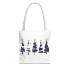 Introducing the perfect Tote Bag for the festive season! This charming design features beautifully illustrated Christmas trees, radiating a cheerful vibe that embraces the spirit of winter celebrations. Made from 100% durable polyester, it's your ideal companion for holiday shopping, gatherings, or even as a stylish everyday accessory. Whether you're heading to a holiday party or looking for a thoughtful gift, this tote is designed for anyone who loves the joyous ambiance of the season. Perfect for Christmas, New Year's, and other winter festivities, it's a delightful addition to anyone's wardrobe. Carry your essentials in style and spread holiday cheer wherever you go! Product features - 100% durable polyester body for long-lasting use. - Reinforced stitching on handles for added strength Illustrated Christmas Tree, Christmas Tree Tote, Winter Gift, Perfect Tote Bag, Everyday Accessories, Soft Bristle Brush, Holiday Shopping, Gifts Christmas, Festive Season