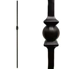 a tall black pole with a long stick sticking out of it's center piece